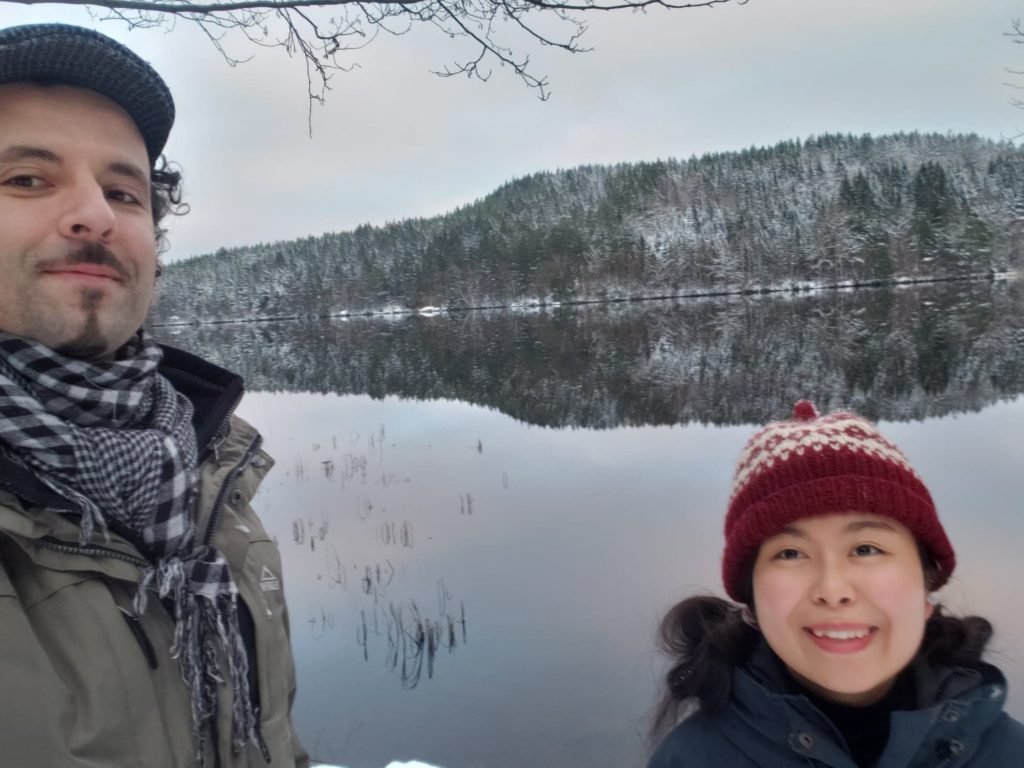 Picture of Japanese Coach Kiyo and her husband in front of a lake